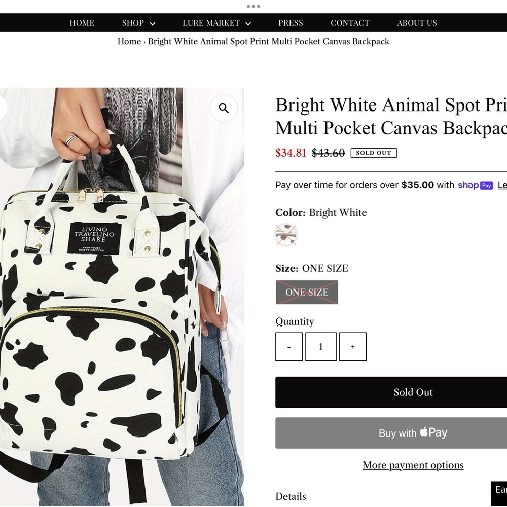 ‘Living Traveling Share’ Canvas Cow Print Backpack - Picture 8 of 8